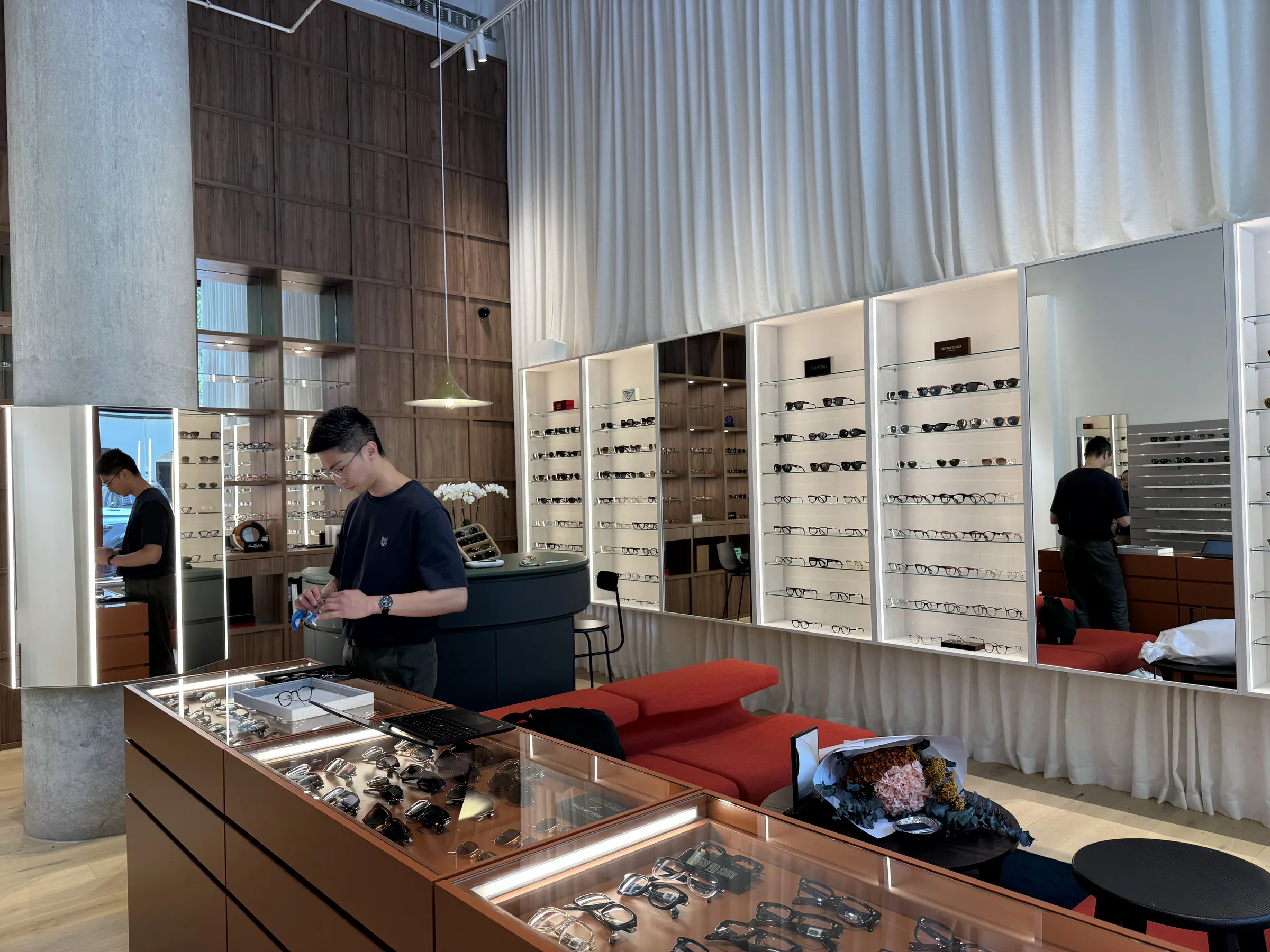 Dr Luke Yong at the lacquer counter at SEASONS Optical.